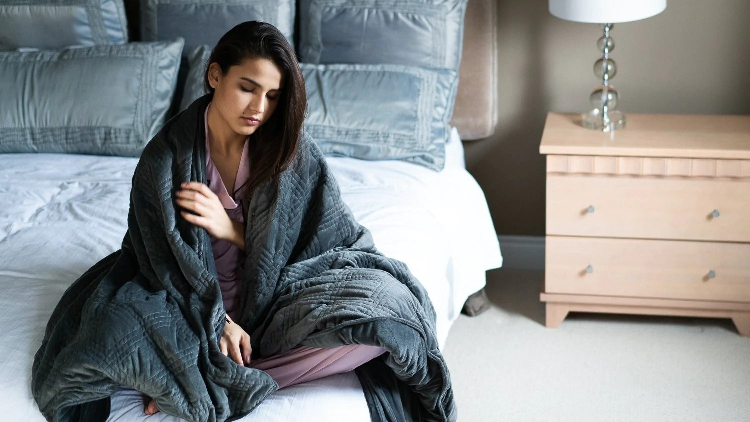 Eight benefits of a weighted blanket and why it's an essential bedroom item  - Lane Report