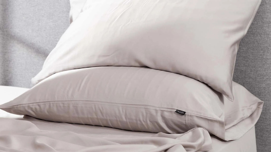 Gray Hush sheets and pillowcases on bed