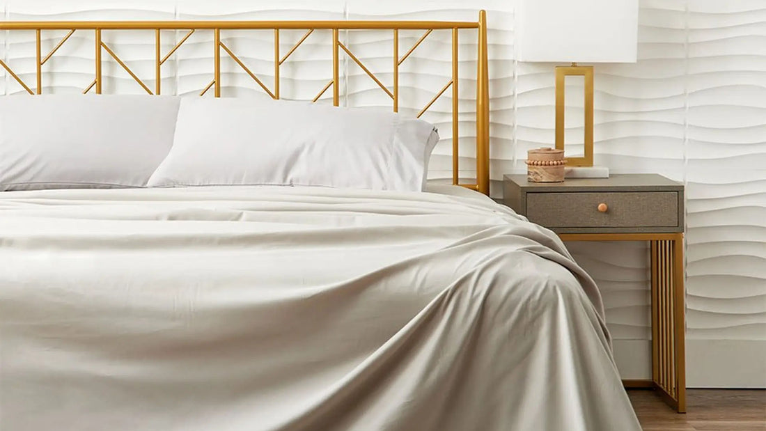 Bed with cream-colored sheets