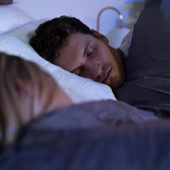 sleep hacks: couple sleeping beside each other